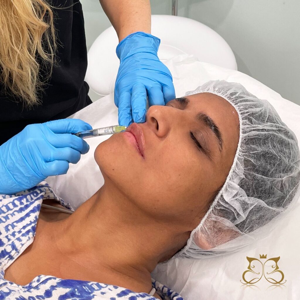 woman getting dermal filler injection